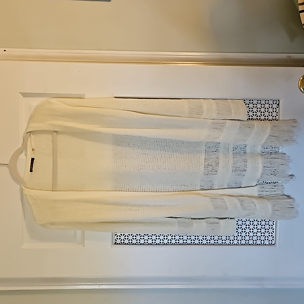Size small cream fringed sweater